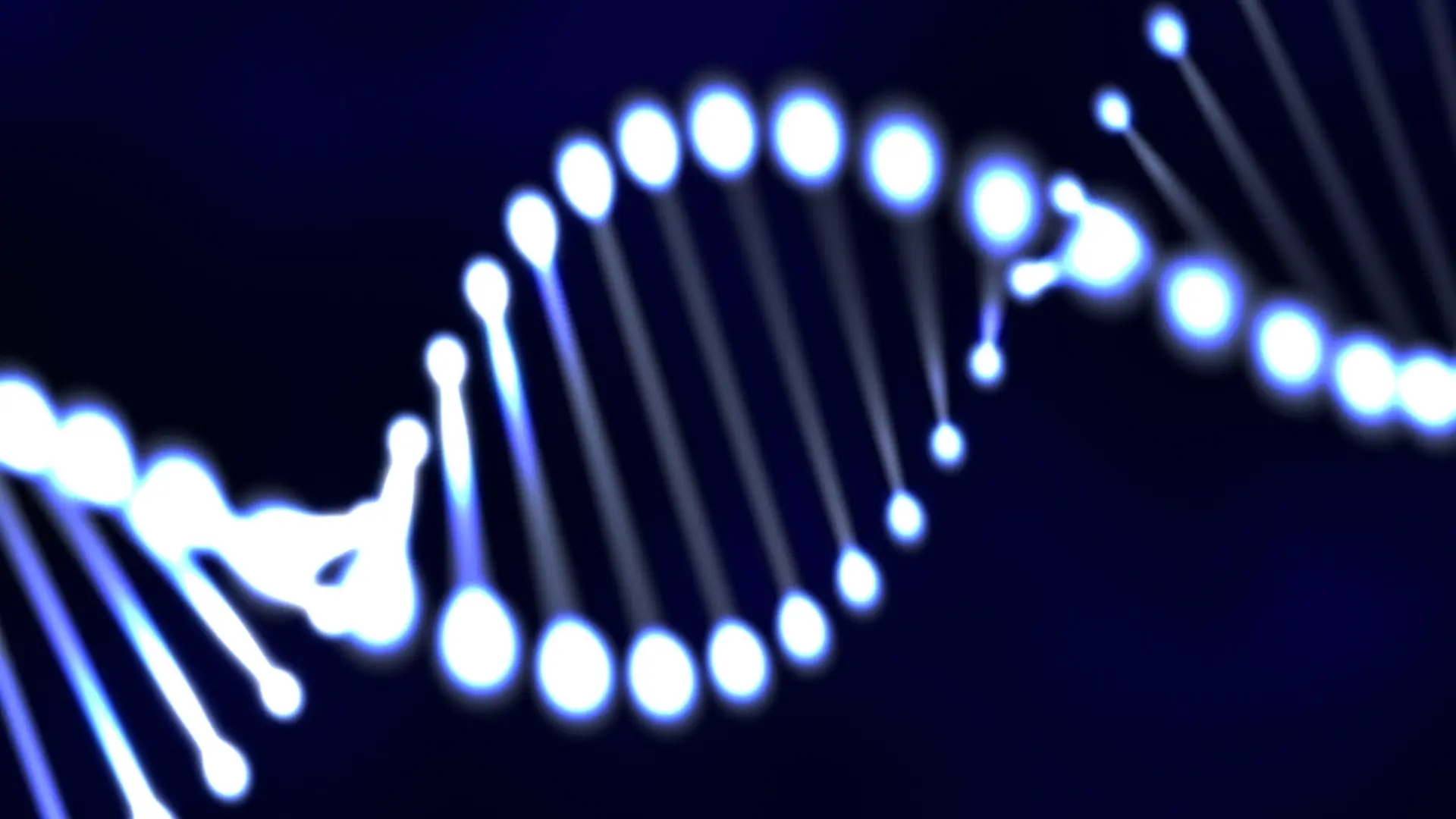 A double helix made of light on a dark background.